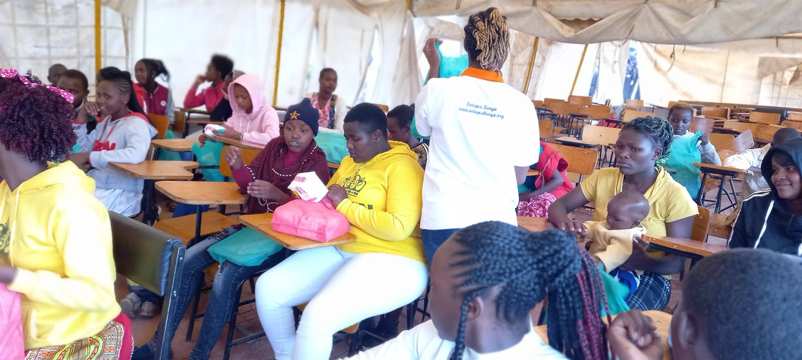 Students seated in a classroom during an Entepesi Kenya health education class