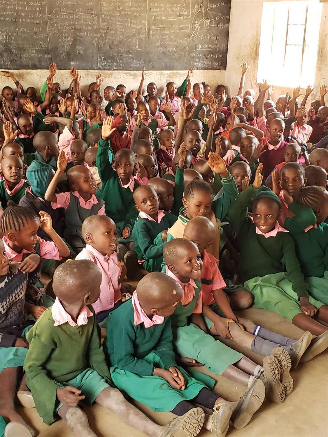 A large group of schoolchildren gathered for an Entepesi Kenya school programme