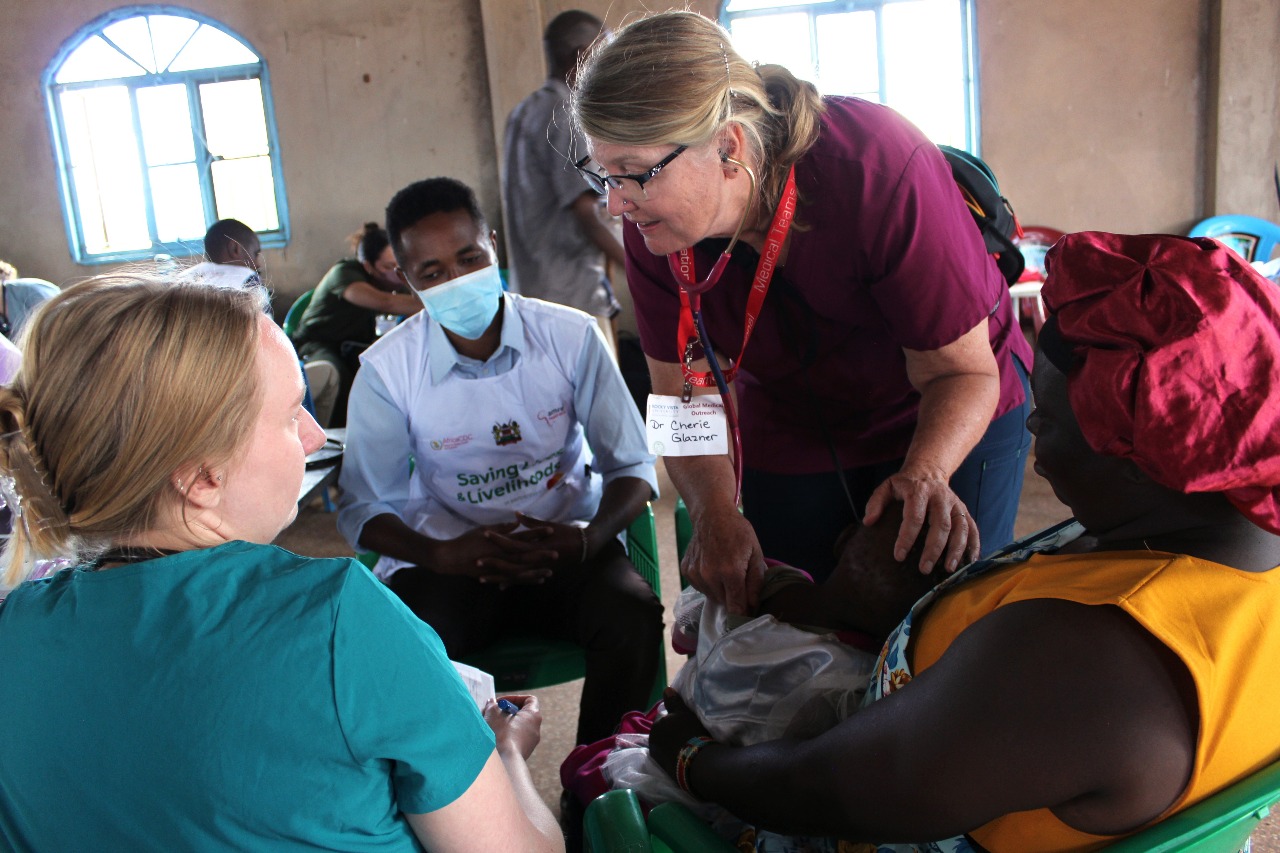 Visiting students working alongside local health workers during a clinical attachment
